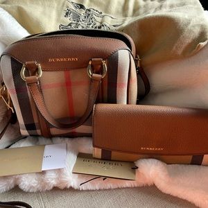 For sale is like new no sign of use Alchester Burberry bag and matching wallet